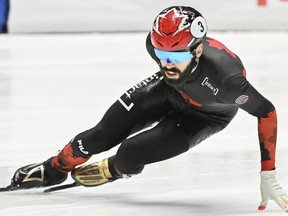 Steven Dubois of Canada skates during the 1500-metre semifinal race at the World Cup Short Track Speedskating event in Montreal, Sunday, Oct. 29, 2023.