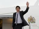 Prime Minister Justin Trudeau as he boards a government plane in Ottawa. 