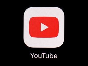 FILE - This March 20, 2018, file photo shows the YouTube app on an iPad in Baltimore. YouTube is rolling out new rules for AI content, Tuesday, Nov. 14, 2023, including requiring creators to reveal whether they've used generative artificial intelligence to make realistic looking videos.