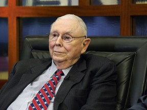 FILE - Berkshire Hathaway Vice Chairman Charlie Munger listens to a question during an interview on May 7, 2018, in Omaha, Neb. Berkshire Hathaway says Munger, who helped Warren Buffett build an investment powerhouse, has died.