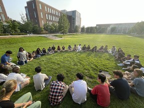Participants in the Summer Science Program sit in a circle at Purdue University in West Lafayette, Ind., on July 21, 2023. SSP has puzzled over what do to with a surprise bequest of an estimated $200 million -- about 100 times its annual budget.