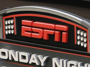 FILE - The ESPN logo is seen, Sept. 16, 2013, prior to an NFL football game between the Cincinnati Bengals and the Pittsburgh Steelers in Cincinnati. ESPN Bet, a rebranded sports-gambling app owned by Penn Entertainment, is set to launch Tuesday, Nov. 14, 2023.