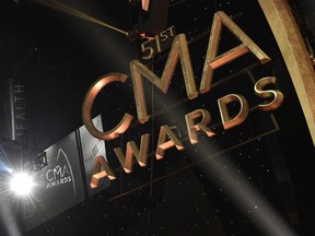 FILE - Signage for the 51st annual CMA Awards appears in lights at the Bridgestone Arena on Wednesday, Nov. 8, 2017, in Nashville, Tenn. The CMA Awards are back Wednesday to honor the top artists in country music, with Lainey Wilson, Jelly Roll, Ashley McBryde and Morgan Wallen among the performers.