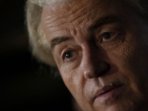Geert Wilders, leader of the Party for Freedom, known as PVV, answers questions to media after announcement of the first preliminary results of general elections in The Hague, Netherlands, Wednesday, Nov. 22, 2023.