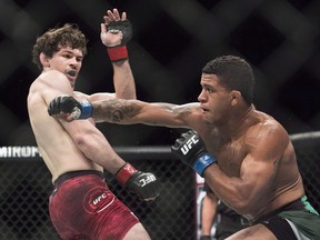 Oliver (The Canadian Gangster) Aubin-Mercier, left, fights Gilbert Burns during the UFC Lightweight bout in Toronto on Saturday, Dec. 8, 2018. Aubin-Mercier knocked out Scotland's Stevie (Braveheart) Ray to win the PFL lightweight title and US$1 million. On Friday, the 34-year-old from Montreal tries to do it again, this time with American (Cassius) Clay Collard standing in his way at the PFL championship in Washington, D.C.