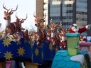 Santa waving the crowd from his buoy toward the crowd during the Santa parade in Toronto on Sunday, November 15, 2015. He will be at the annual downtown event this Sunday.