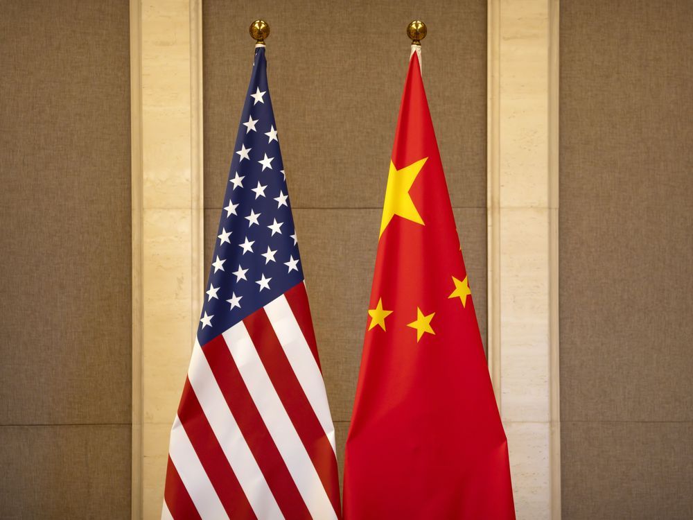 FILE - United States and Chinese flags are set up before a meeting between Treasury Secretary Janet Yellen and Chinese Vice Premier He Lifeng at the Diaoyutai State Guesthouse in Beijing, on July 8, 2023. China said the United States is the 