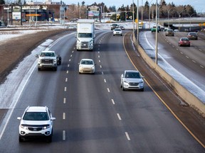 Vehicles travel along Edmonton's Whitemud Drive freeway.