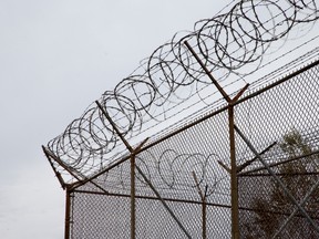Barbed wire tops the fences as officials conducted a media tour of the Ottawa Carleton Detention Centre on Innes Rd.