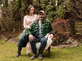 Maple Ridge's Toby Cleary, who is currently battling Stage 4 colon cancer, sits with his wife, Danielle Raymond, in the backyard of their Maple Ridge home.