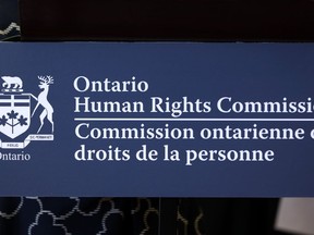 The Ontario Human Rights Commission is set to release its final report into anti-Black racism in Toronto's police force today. A sign for the commission is seen at a news conference in Vaughan, Ont., on Friday, Sept. 20, 2019.