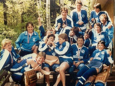 The Chimos at their coach's cabin, celebrating their 1984 nationals win.