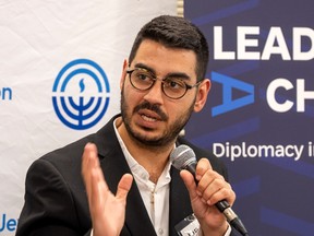 Jonathan Elkhoury speaking at an event.