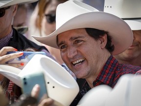 Prime Minister Justin Trudeau greets the crowds at the Calgary Stampede on July 10, 2022.