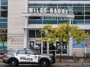 A police vehicle sits out front of the Miles Nadal Jewish Community Centre in Toronto