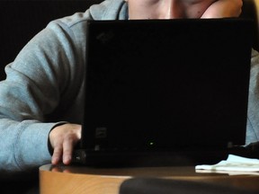 Man looking at computer.