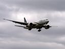 A Pakistan International Airlines flight prepares to land at Toronto Pearson International Airport.