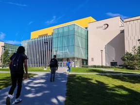 Students walk at the University of Calgary campus.