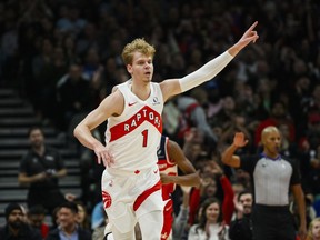 Toronto Raptors guard Gradey Dick (1) celebrates after scoring a three point basket during first half NBA basketball action against the Washington Wizards, in Toronto, Monday, Nov. 13, 2023.