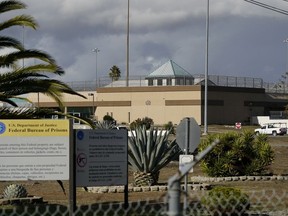 FILE - The Federal Correctional Institution stands in Dublin, Calif., on Dec. 5, 2022. A former federal correctional officer was sentenced Friday, Dec. 1, 2023, to more than five years in prison for sexually abusing two inmates at a women's prison in California where the warden and other employees were charged with similar conduct. A federal jury in June found John Russell Bellhouse guilty on five counts of sexual abuse for incidents involving the two women between 2019 and 2020 at FCI Dublin, about 20 miles (30 kilometers) east of Oakland.
