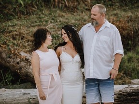 Dan Quayle, who died of esophageal cancer on Nov. 24, with his step-daughter, Shayleen Griffiths (middle) and wife Kathleen Carmichael on Shayleen's wedding day. Photo Credit: Britt Lawerance / The Painted Fox Photography.