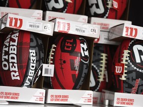 The Ottawa Redblacks have named Tommy Condell as their new offensive co-ordinator. The logos of the CFL and the Ottawa Redblacks are seen on mini footballs in Ottawa on Tuesday, May 17, 2022.