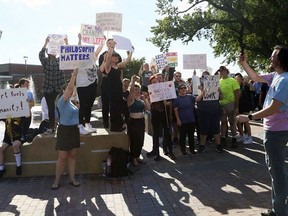 Students and other supporters protest budget cuts at the University of Nebraska on Monday, Oct. 2, 2023 in Kearney, Neb. In December, the university announced the elimination of 24.5 faculty positions and nine academic degrees.