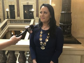 FILE - Shannon Holsey, president of the Stockbridge-Munsee tribe, speaks to reporters after giving the annual State of the Tribes address in the Wisconsin state Capitol Tuesday, April 4, 2017, in Madison, Wisc. Indigenous students from any of Wisconsin's 11 tribes will be able to attend the University of Wisconsin-Madison for free beginning next fall, Chancellor Jennifer Mnookin announced Monday, Dec. 18, 2023. Holsey called the aid program