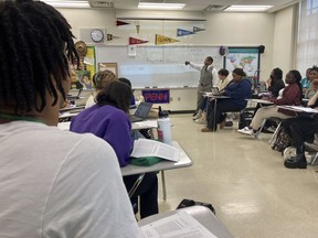 FILE - Emmitt Glynn teaches to a group of Baton Rouge Magnet High School students, Jan. 30, 2023, in Baton Rouge, La. On Wednesday, Dec. 6, 2023, the College Board released an updated framework for its new Advanced Placement African American Studies course, months after the non-profit testing company came under intense scrutiny for engaging with conservative critics.