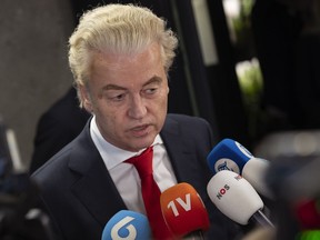 Geert Wilders, leader of the far-right party PVV, or Party for Freedom, talks to the media after a meeting with speaker of the House Vera Bergkamp, two days after Wilders won the most votes in a general election, in The Hague, Netherlands, Friday Nov. 24, 2023.