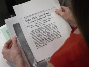 Suzanne Morgan flips through a dossier of photos and news clippings about her grandfather Jack Morgan. Born in 1894, Morgan led a colourful life, marrying several times simultaneously and spending time in prison before settling in Canada. Morgan learned of long-lost family members in the US through a DNA search.
