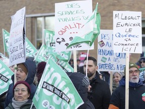 Quebec public sector workers in health, education and social services hold a day-long strike in Montreal, Monday, Nov. 6, 2023. Negotiations between the Quebec government and unions representing hundreds of thousands of public-sector employees resumed Tuesday after a short Christmas break.