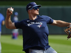 Toronto Blue Jays third baseman Matt Chapman throws during batting practice before Game 1 of an AL wild-card baseball playoff series against the Minnesota Twins Tuesday, Oct. 3, 2023, in Minneapolis. The Blue Jays have been forced to pivot after missing out on two-way superstar Shohei Ohtani, who agreed to a US$700-million, 10-year contract with the Los Angeles Dodgers last week.THE CANADIAN PRESS /AP/Bruce Kluckhohn