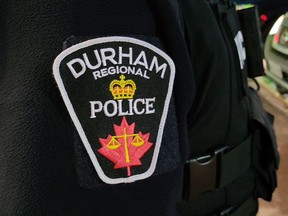 Durham Regional Police have released body camera footage showing the capture of a kangaroo that escaped east of Toronto last week. A Durham Regional Police officer's logo emblem is shown in Bowmanville, Ont. on Tuesday Feb. 28, 2023.