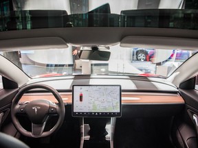 A interior dash view of Tesla's Model 3 in Washington, D.C.