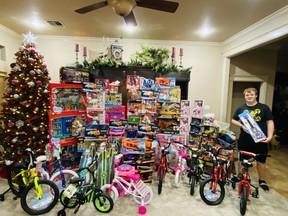 Reed Marcum with some of the toys donated by people in McAlester, Okla., last year for the annual 4-H Toy Giveaway that he started in 2016.