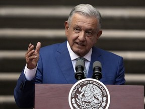 FILE - Mexican President Andres Manuel Lopez Obrador speaks at the National Palace in Mexico City, Jan. 10, 2023. Mexico's president vowed Monday, Dec. 11, 2023 to try to eliminate almost all remaining government oversight and regulatory agencies before he leaves office on Sept. 30, claiming they are "useless" and cost too much.