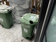 In a post to the Old East Village Community page on Facebook, resident Taylor Conley shared this image of their green bin on a patio with a gaping hole seemingly chewed through the corner. (Facebook photo)