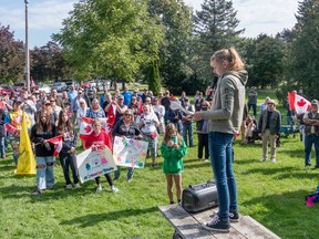Janelle Meredith of Selkirk speaks to a crowd of about 400 people taking part in a One Million March in Simcoe, Ontario on Wednesday September 20, 2023 to express their opposition to teachings of gender identity and sexuality in the school system.