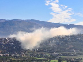 Smoke rises above the southern Lebanese border village of Khiam