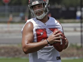Tampa Bay Buccaneers tight end Antony Auclair (82), catches a ball during practice at the NFL football team's training camp Thursday, May 31, 2018, in Tampa, Fla. The Canadian-born tight end announced Wednesday he is retiring from pro football.