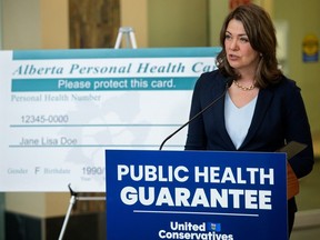 Danielle Smith announces the UCP's public health guarantee in Edmonton on April 11, 2023.