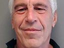 Jeffrey Epstein poses for a sex offender mugshot after being charged with procuring a minor for prostitution on July 25, 2013 in Florida.