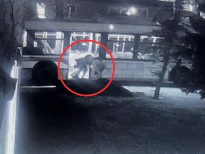 A man falling from a public transit bus.