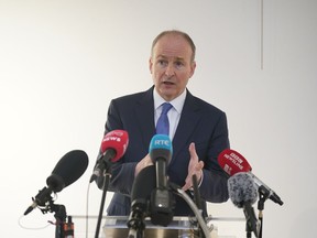 Tanaiste Micheal Martin speaks during a visit to the Ulster Museum to meet with business leaders and view an exhibition on 25 years of North-South co-operation, in Belfast, Wednesday, Jan. 31, 2024. Northern Ireland's largest British unionist party agreed Tuesday to end a boycott that left the region's people without a power-sharing administration for two years and rattled the foundations of the 25-year-old peace. The breakthrough could see the shuttered Belfast government restored within days, with Irish nationalist party Sinn Fein holding the post of first minister for the first time.