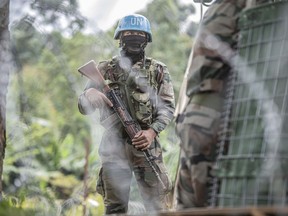 FILE - MONUSCO blue helmet deployed near Kibumba, north of Goma, Democratic Republic of Congo, on Jan. 28, 2022. The United Nations peacekeeping mission in Congo which helped in the fight against rebels for more than two decades before being asked by the Congolese government to leave will complete its withdrawal from the Central African nation by the end of 2024, the mission said Saturday Jan. 13, 2024.