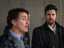 Housing Minister Sean Fraser, right, listens to Prime Minister Justin Trudeau speak during a news conference for a housing announcement in Vancouver, B.C., on Dec. 15, 2023.