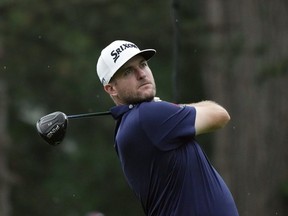 Taylor Pendrith has made a career of playing his way into big events. The PGA Tour's new schedule will let him do just that. Pendrith drives off the fourth tee during the final round of the Rocket Mortgage Classic golf tournament at Detroit Country Club, in Detroit, Sunday, July 2, 2023.