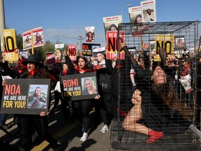 Relatives and friends of Israeli hostages march for their release.