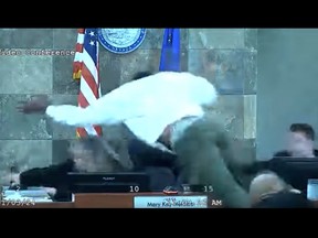 A defendant attacking a judge in court.